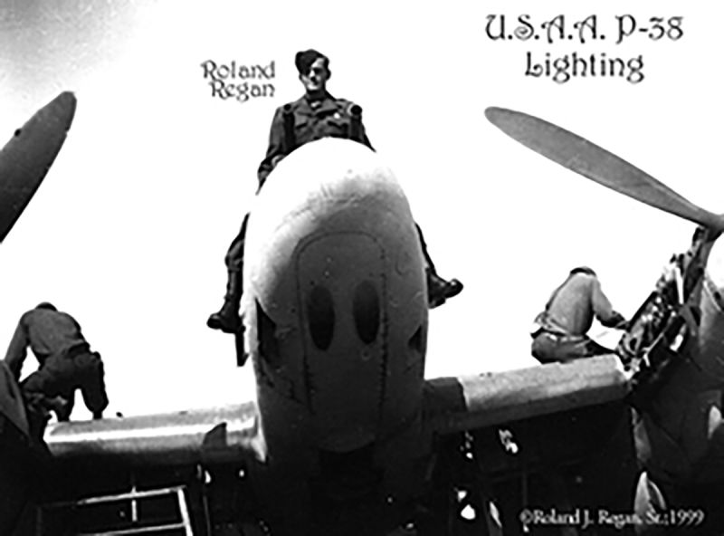 Roland atop the twin engine fighter P-38 Lightening